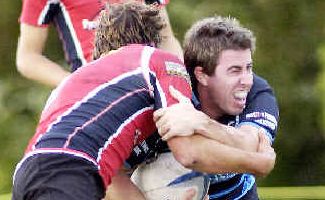 Can't shake him: Ballina’ Adam Fisher (right) tries to dodge a Wollongbar-Alstonville defender in the FNCRU semi-final at Lismore Rugby Park on Saturday. Can't shake him: Ballina’ Adam Fisher (right) tries to dodge a Wollongbar-Alstonville defender in the FNCRU semi-final at Lismore Rugby Park on Saturday.